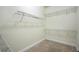 Walk-in closet with wall mounted shelves and carpeted floor offers ample storage at 108 Gaslight Blvd, Summerville, SC 29483