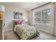 A charming bedroom filled with natural light and adorned with vibrant butterfly artwork at 108 O'Leary Cir, Summerville, SC 29483