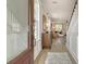 Inviting foyer with dark wood floors, complemented by staircase and view into the living area at 108 O'Leary Cir, Summerville, SC 29483