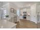 This well-lit kitchen boasts stainless steel appliances, white cabinets, and beautiful countertops at 108 O'Leary Cir, Summerville, SC 29483