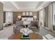 Elegantly furnished main bedroom with natural lighting, stylish sitting area and tray ceiling at 108 O'Leary Cir, Summerville, SC 29483