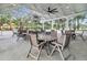 Covered outdoor seating area with multiple tables and chairs, ideal for community gatherings and events at 108 O'Leary Cir, Summerville, SC 29483