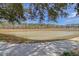 Scenic pond view surrounded by lush greenery and trees, offering a tranquil natural setting at 108 O'Leary Cir, Summerville, SC 29483