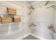 Well-organized walk-in closet with custom shelving and storage solutions at 108 O'Leary Cir, Summerville, SC 29483