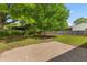 Expansive backyard with a large tree and privacy fence, perfect for outdoor activities at 111 Driver Ave, Summerville, SC 29483