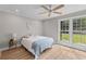 Inviting bedroom with large windows, a ceiling fan, and stylish decor at 111 Driver Ave, Summerville, SC 29483