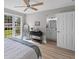 Bedroom showcasing natural light from large windows and featuring an ensuite bathroom at 111 Driver Ave, Summerville, SC 29483