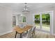 Inviting dining room featuring backyard views through sliding glass doors and a bay window at 111 Driver Ave, Summerville, SC 29483