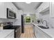 Modern kitchen with stainless steel appliances and sleek countertops at 111 Driver Ave, Summerville, SC 29483