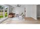 Bright living room features wood accents, a ceiling fan, and lots of natural light at 111 Driver Ave, Summerville, SC 29483