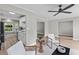 Open-concept living room with natural light flowing into the adjoining kitchen at 111 Driver Ave, Summerville, SC 29483