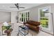 Cozy living room with bay window, modern furniture, and a stylish ceiling fan at 111 Driver Ave, Summerville, SC 29483