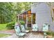 Back patio with outdoor seating, grill and screened-in porch at 111 Garden Hill Rd, Summerville, SC 29483