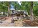Wooded lot featuring outdoor entertaining area and a trailer at 111 Garden Hill Rd, Summerville, SC 29483