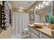 Stylish bathroom featuring a unique vessel sink, granite countertop, and modern fixtures at 111 Garden Hill Rd, Summerville, SC 29483