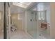 Modern bathroom featuring tiled floor, glass shower and installed bench for a luxurious experience at 111 Garden Hill Rd, Summerville, SC 29483