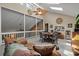 Comfortable bonus room with natural light, a unique ceiling fan, and loft access at 111 Garden Hill Rd, Summerville, SC 29483