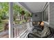 Relaxing porch area with comfortable seating and view of lush greenery at 111 Garden Hill Rd, Summerville, SC 29483
