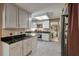 Updated kitchen with granite countertops, white cabinetry, and stainless steel appliances at 111 Garden Hill Rd, Summerville, SC 29483