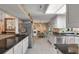 Bright, updated kitchen with granite counters, white cabinets, and stainless steel appliances at 111 Garden Hill Rd, Summerville, SC 29483