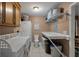 Well-organized laundry room with storage, folding area, washer and dryer at 111 Garden Hill Rd, Summerville, SC 29483