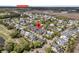 Aerial view of a charming neighborhood, showcasing well-manicured lawns and tree-lined streets at 112 Brailsford St, Charleston, SC 29492