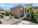 Backyard with a patio, outdoor seating, brick accents, and well-manicured landscaping at 112 Brailsford St, Charleston, SC 29492