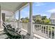 Relaxing balcony featuring outdoor seating with neighborhood views at 112 Brailsford St, Charleston, SC 29492
