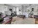 Spacious living area with comfortable seating, a sofa, and a dedicated exercise space at 112 Brailsford St, Charleston, SC 29492