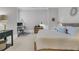 Serene main bedroom with a comfortable bed, cozy sitting area, and stylish decor at 112 Brailsford St, Charleston, SC 29492
