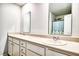 Bathroom features a double sink vanity with modern chrome faucets and a large mirror at 115 E East Sunrise Lane, Summerville, SC 29486