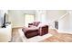 Bright living room featuring wood floors, recessed lighting, comfortable seating, and a neutral color palette at 115 E East Sunrise Lane, Summerville, SC 29486