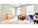 Office space with large windows, plush chairs, and modern desk setup at 115 E East Sunrise Lane, Summerville, SC 29486