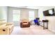 Office space with large windows, plush chairs, and modern desk setup at 115 E East Sunrise Lane, Summerville, SC 29486