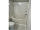 Clean, white bathroom featuring a tub/shower combination and sleek design elements at 1300 Park West Blvd # 516, Mount Pleasant, SC 29466