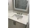 Close-up of bathroom vanity with modern faucet and white countertop at 1300 Park West Blvd # 516, Mount Pleasant, SC 29466