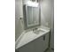 Bathroom vanity with modern faucet, black hardware, and white countertop at 1300 Park West Blvd # 516, Mount Pleasant, SC 29466