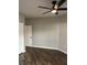 A spacious bedroom featuring hardwood floors and a ceiling fan at 1300 Park West Blvd # 516, Mount Pleasant, SC 29466