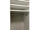 Bright, built-in closet with chrome rod and white shelving to maximize storage space at 1300 Park West Blvd # 516, Mount Pleasant, SC 29466