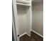 Interior view of closet space with chrome hanging rod and storage shelves at 1300 Park West Blvd # 516, Mount Pleasant, SC 29466