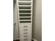 Built-in closet featuring a combination of shelving and drawers for efficient organization at 1300 Park West Blvd # 516, Mount Pleasant, SC 29466