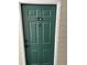 Stylish, green front door with unit number and classic knocker at 1300 Park West Blvd # 516, Mount Pleasant, SC 29466