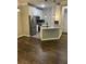 Open concept kitchen with island seating, stainless steel appliances, and modern pendant lighting at 1300 Park West Blvd # 516, Mount Pleasant, SC 29466
