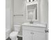 Clean bathroom with white cabinets, modern fixtures, and a vanity at 131 Brown Swiss Cir, Summerville, SC 29483