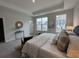 Bedroom with neutral tones, an abundance of natural light, and views of the community at 131 Brown Swiss Cir, Summerville, SC 29483