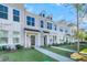 Inviting townhome showcasing a landscaped front yard and classic design at 131 Brown Swiss Cir, Summerville, SC 29483