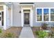 Attractive front door with modern hardware and a welcoming entryway at 131 Brown Swiss Cir, Summerville, SC 29483
