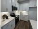 Bright kitchen featuring white cabinets, stainless steel appliances, and a subway tile backsplash at 131 Brown Swiss Cir, Summerville, SC 29483