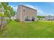 Spacious backyard with green grass with room for outdoor activities at 134 Stoney Creek Way, Moncks Corner, SC 29461