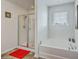 This bathroom is equipped with both a shower and a soaking tub by the window at 134 Stoney Creek Way, Moncks Corner, SC 29461